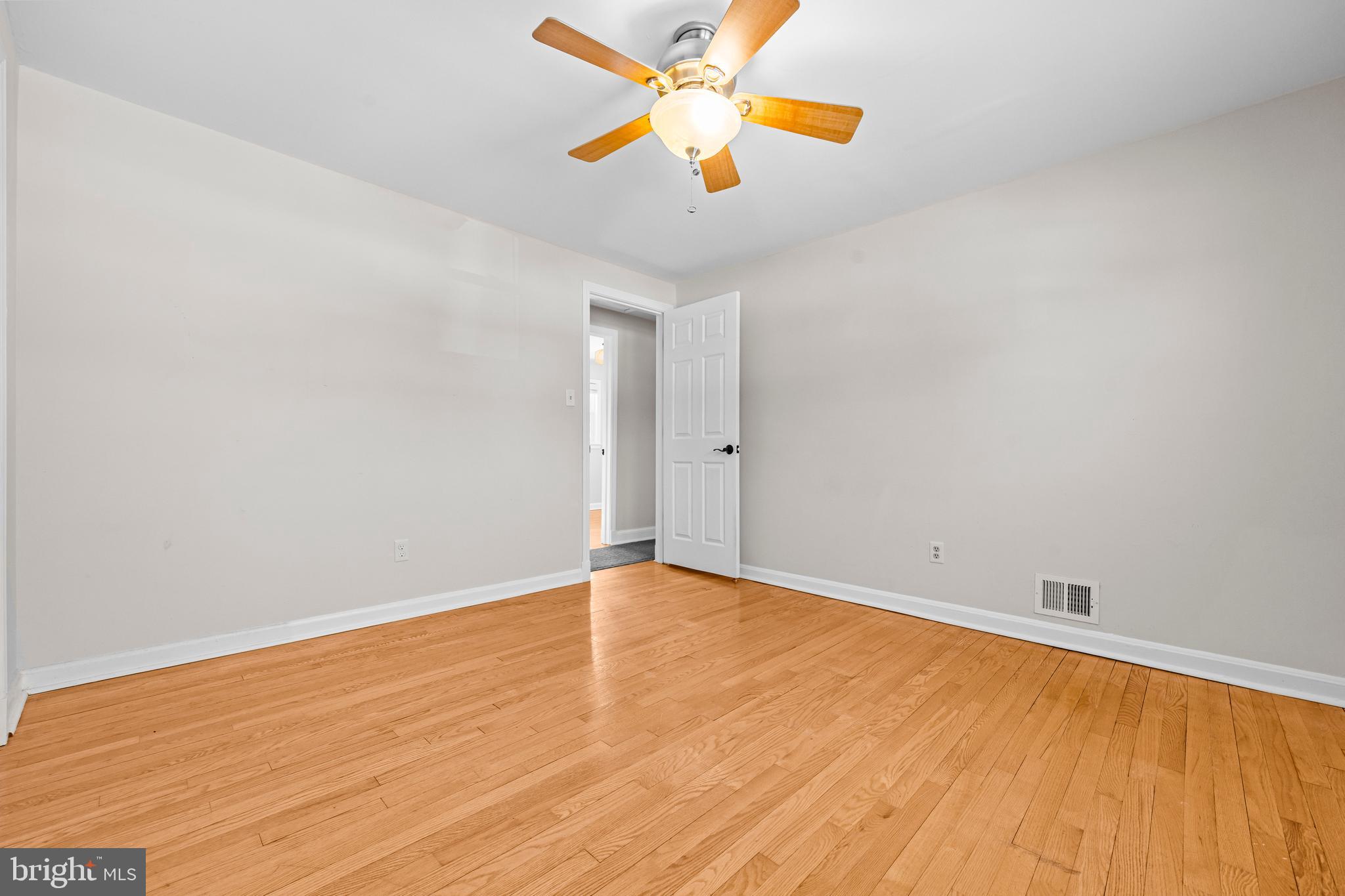 6813 Derrell Court Alexandria, VA 22307 - Photo 18 of 34 an empty room with ceiling fan and window