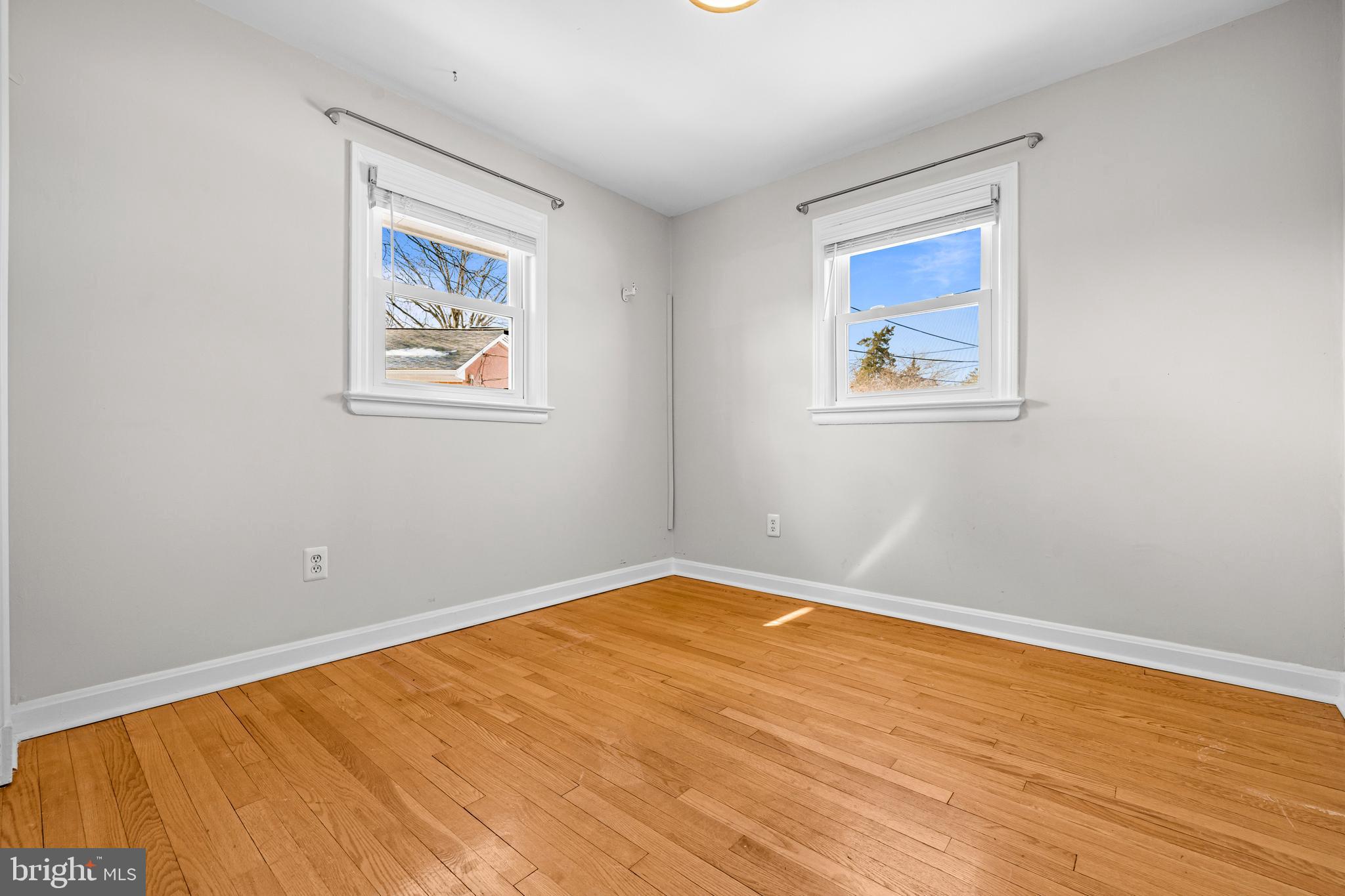 6813 Derrell Court Alexandria, VA 22307 - Photo 19 of 34 a view of an empty room with wooden floor