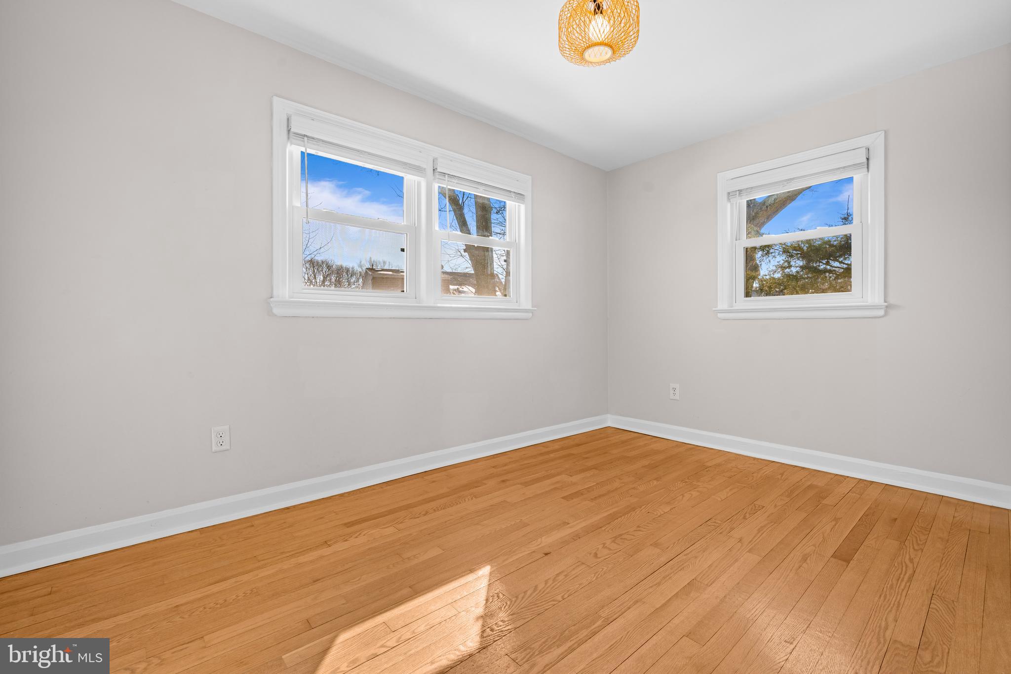 6813 Derrell Court Alexandria, VA 22307 - Photo 24 of 34 a view of empty room with wooden floor