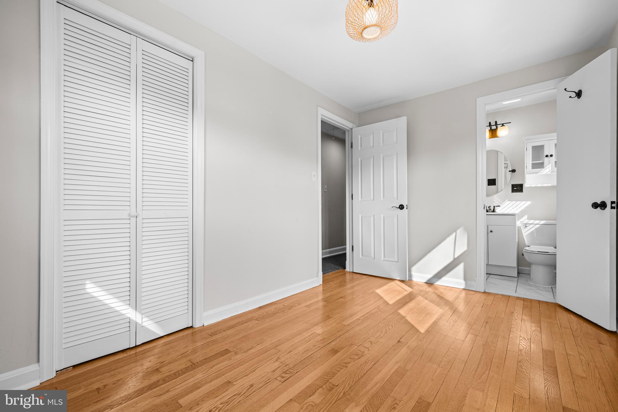 6813 Derrell Court Alexandria, VA 22307 - Photo 25 of 34 a view of empty room with wooden floor
