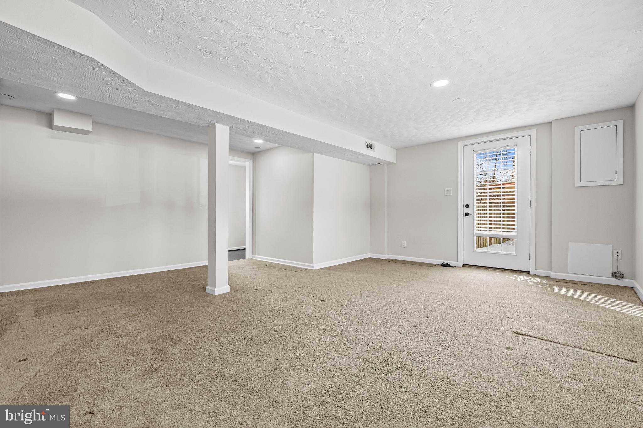 6813 Derrell Court Alexandria, VA 22307 - Photo 28 of 34 a view of an empty room with a window