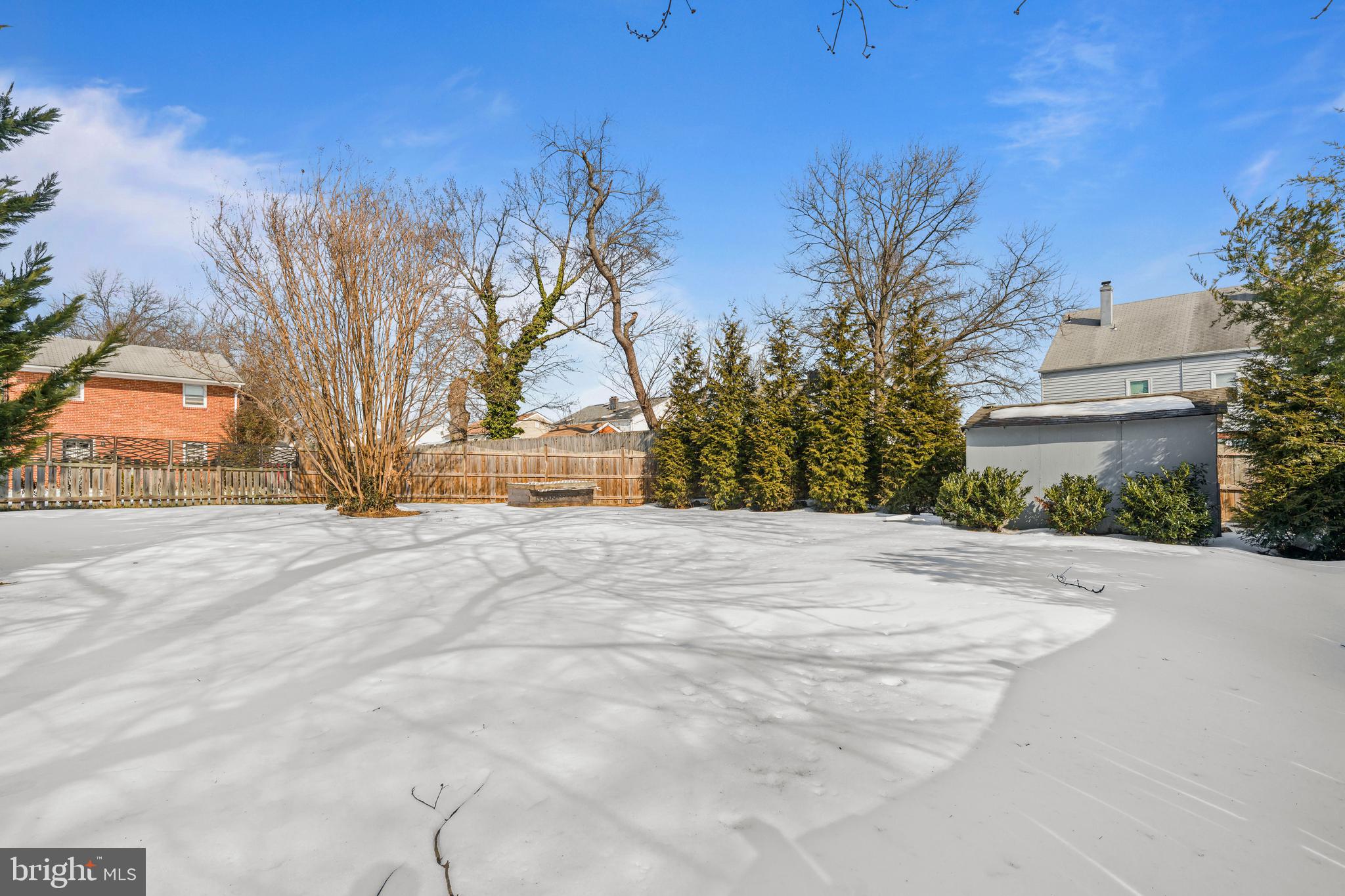 6813 Derrell Court Alexandria, VA 22307 - Photo 32 of 34 a view of a backyard of a house