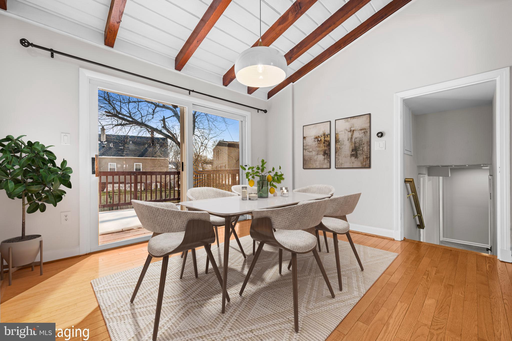 6813 Derrell Court Alexandria, VA 22307 - Photo 8 of 34 a view of a dining room with furniture and wooden floor