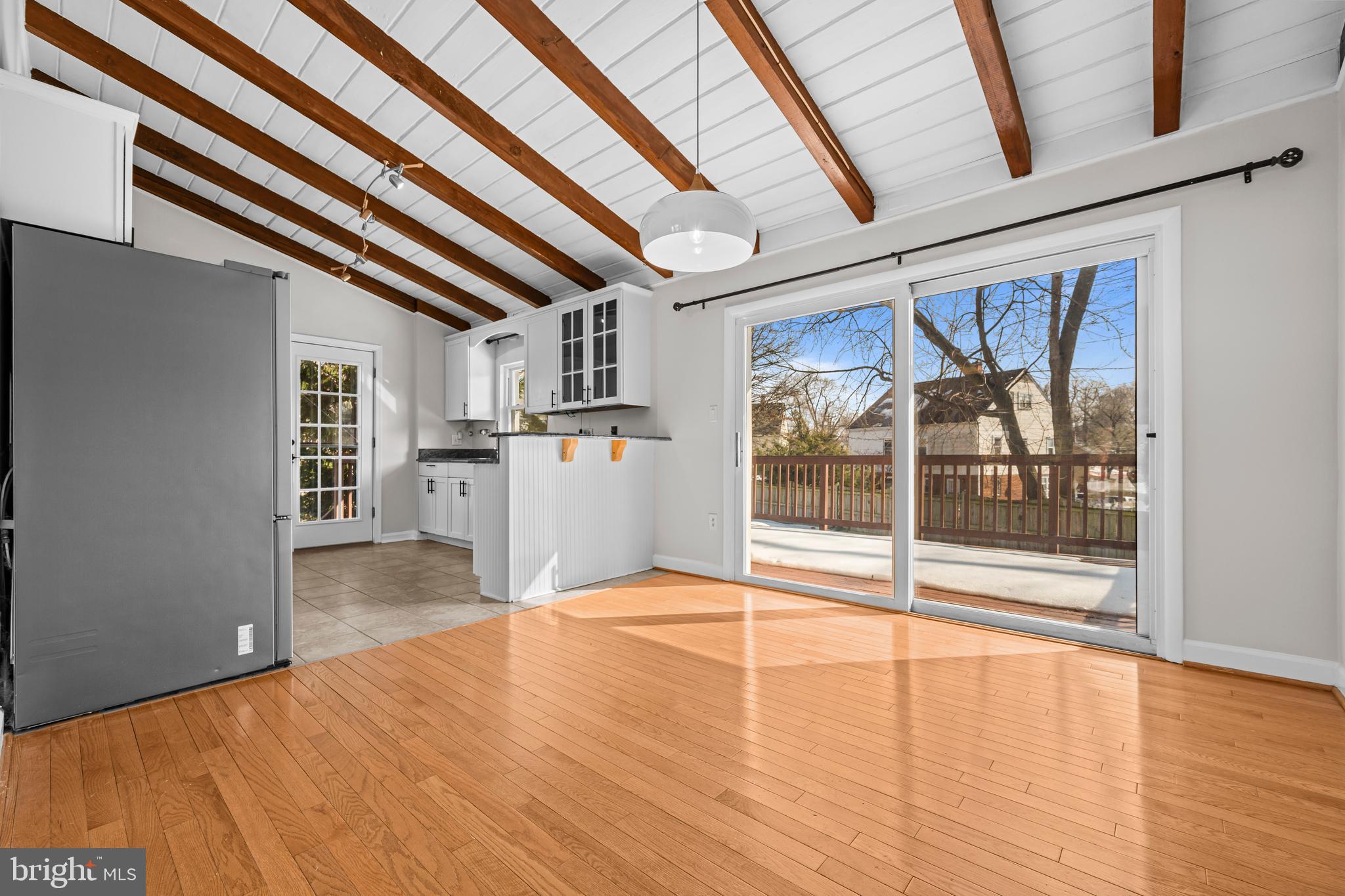 6813 Derrell Court Alexandria, VA 22307 - Photo 10 of 34 a view of empty room with wooden floor and fan