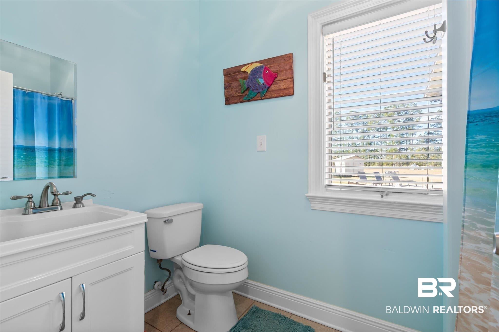 15635 County Road 83 Elberta, AL 36530 - Photo 19 of 54 Bathroom featuring toilet, a shower with curtain, vanity, and tile patterned floors