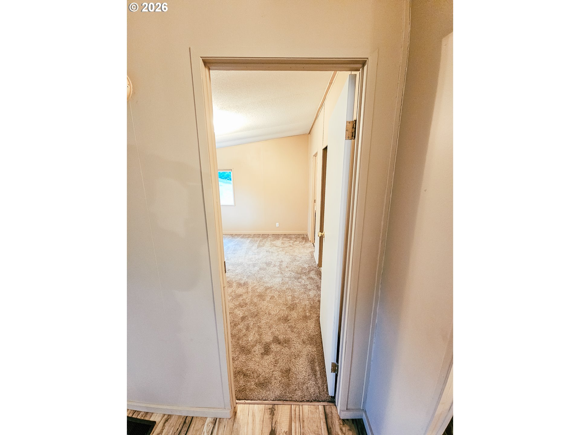 295 Easy Street Road Silverlake, WA 98645 - Photo 12 of 42 a view of a bathroom with mirror and a gate