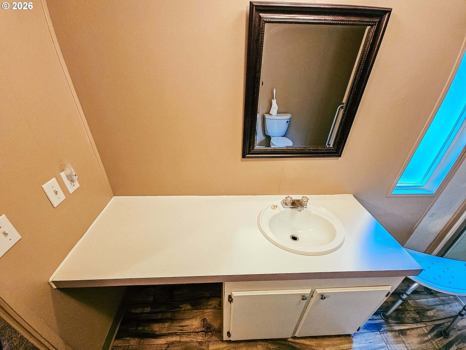 295 Easy Street Road Silverlake, WA 98645 - Photo 14 of 42 a bathroom with a sink and a mirror