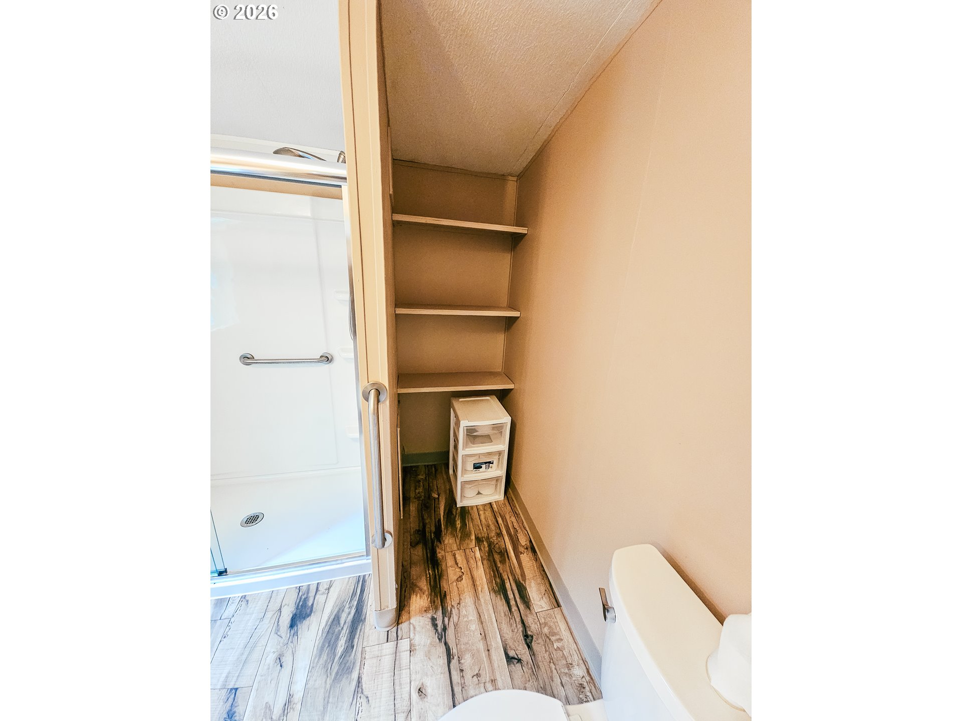 295 Easy Street Road Silverlake, WA 98645 - Photo 16 of 42 a view of a hallway with wooden floor