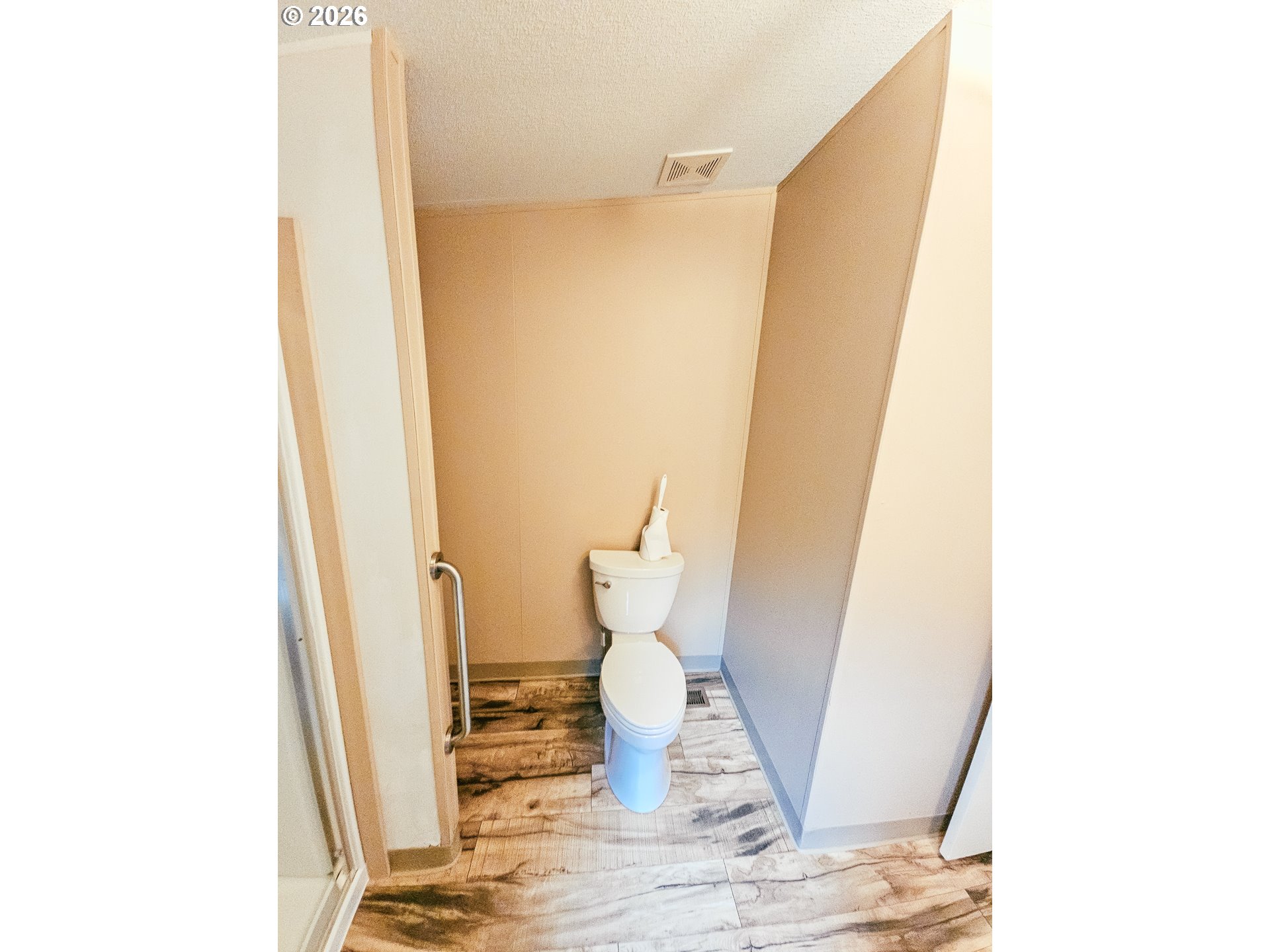 295 Easy Street Road Silverlake, WA 98645 - Photo 17 of 42 a bathroom with a sink and a toilet