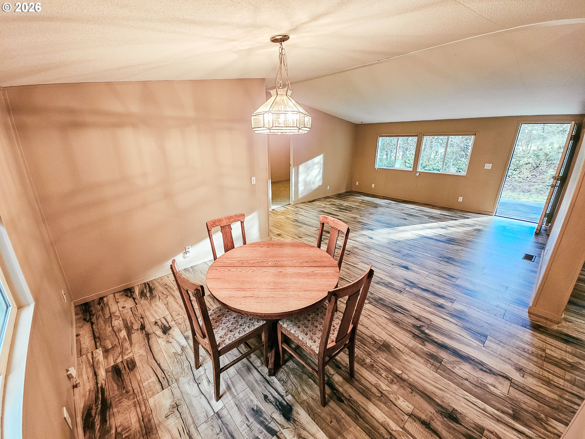 295 Easy Street Road Silverlake, WA 98645 - Photo 22 of 42 a view of a dining room with furniture and window