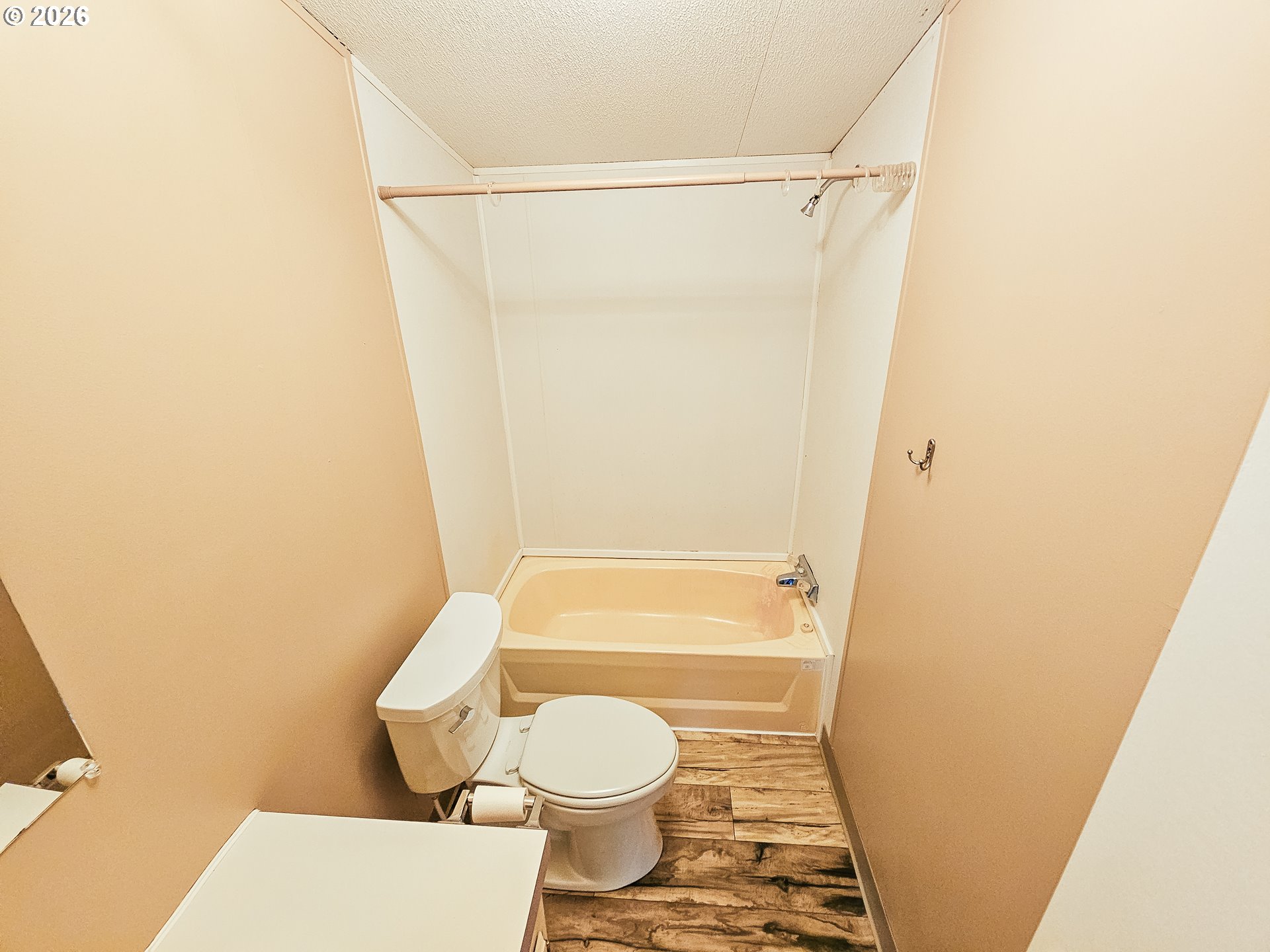 295 Easy Street Road Silverlake, WA 98645 - Photo 24 of 42 a bathroom with a granite countertop toilet and a shower
