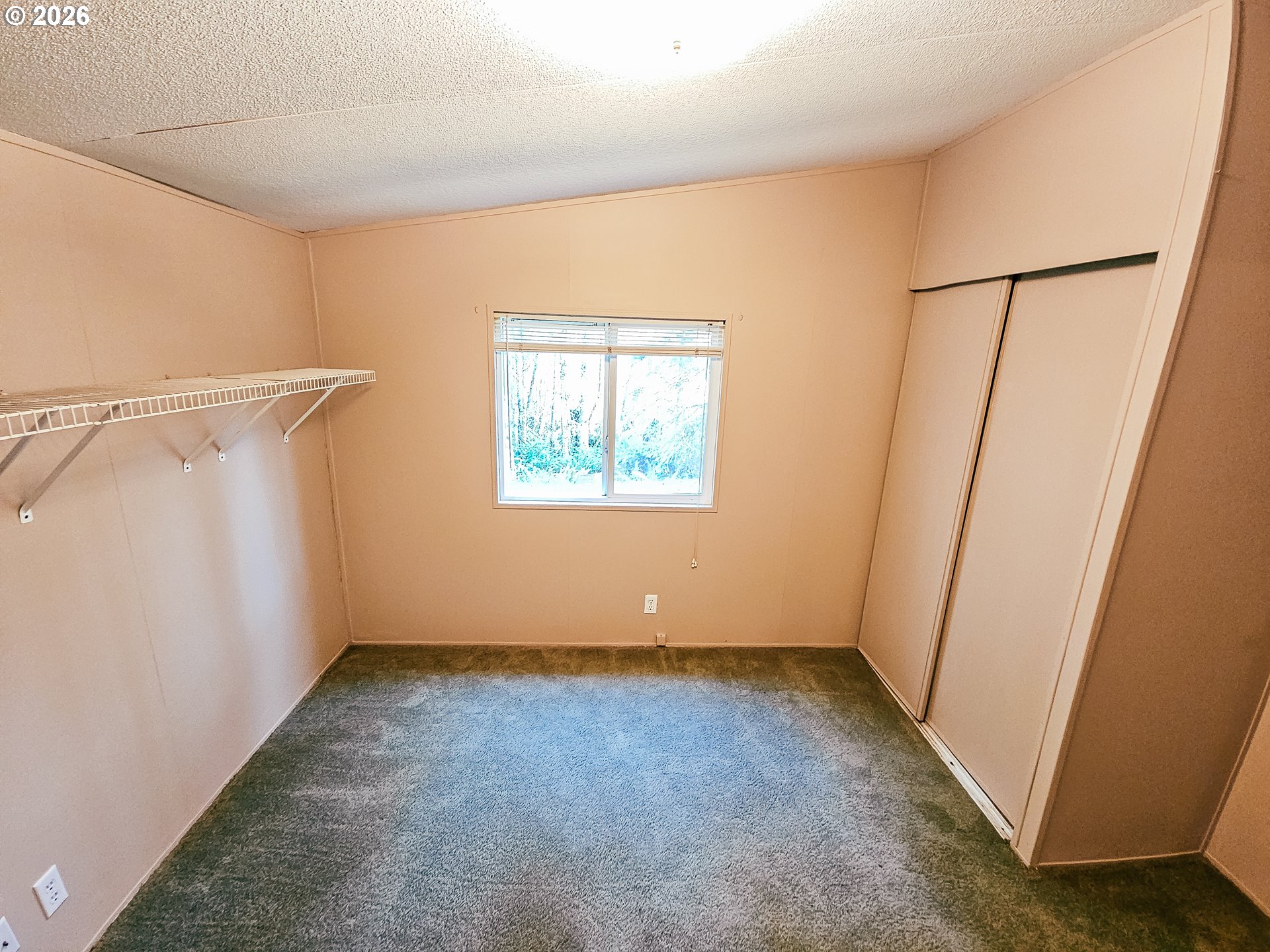 295 Easy Street Road Silverlake, WA 98645 - Photo 31 of 42 a view of an empty room with a window