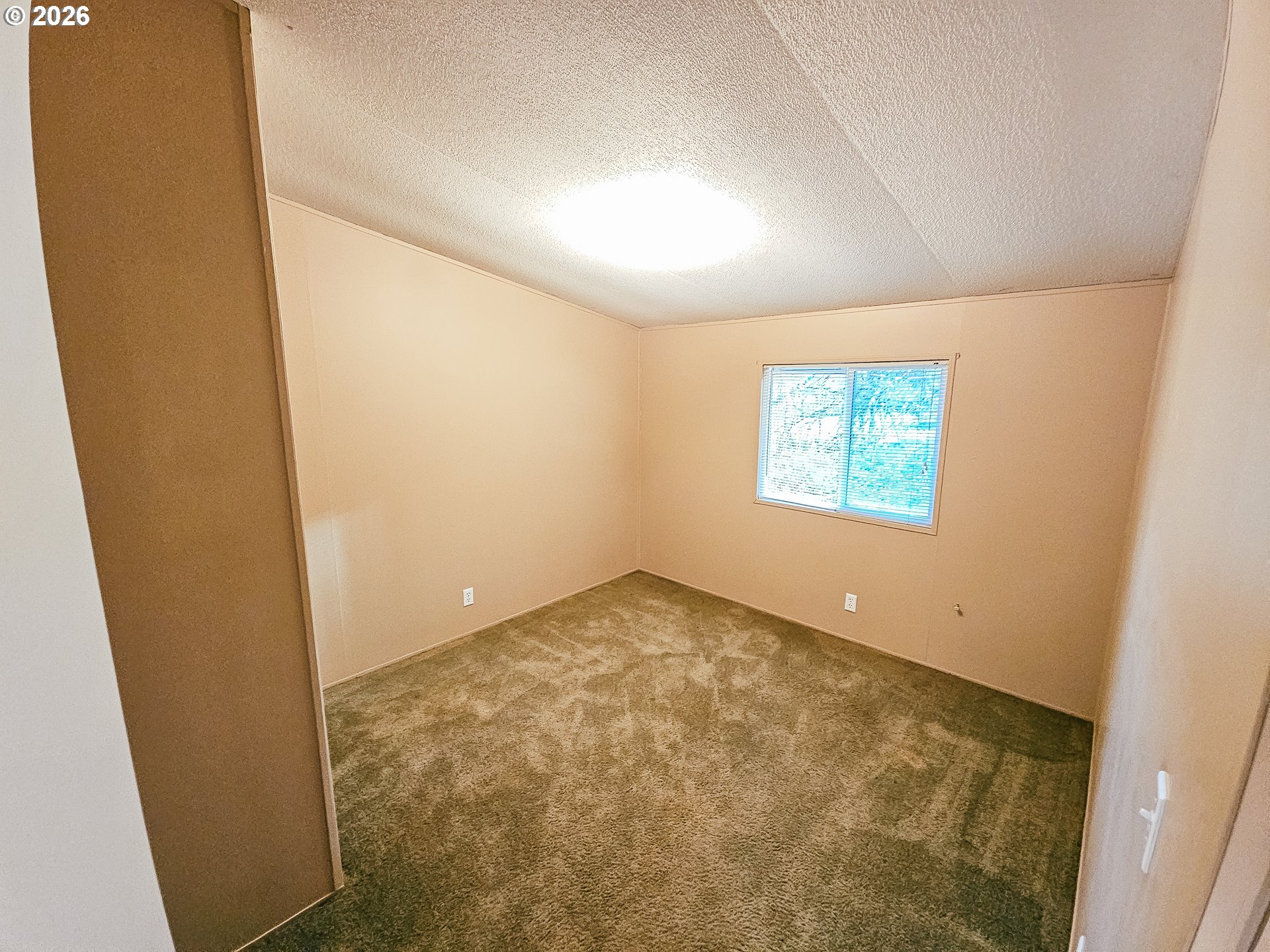 295 Easy Street Road Silverlake, WA 98645 - Photo 32 of 42 an empty room with windows