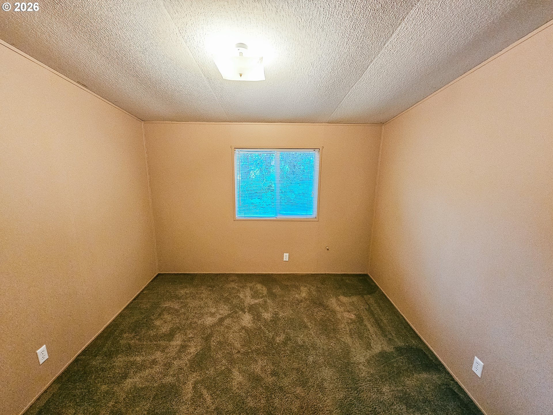 295 Easy Street Road Silverlake, WA 98645 - Photo 8 of 42 an empty room with a empty space and a window