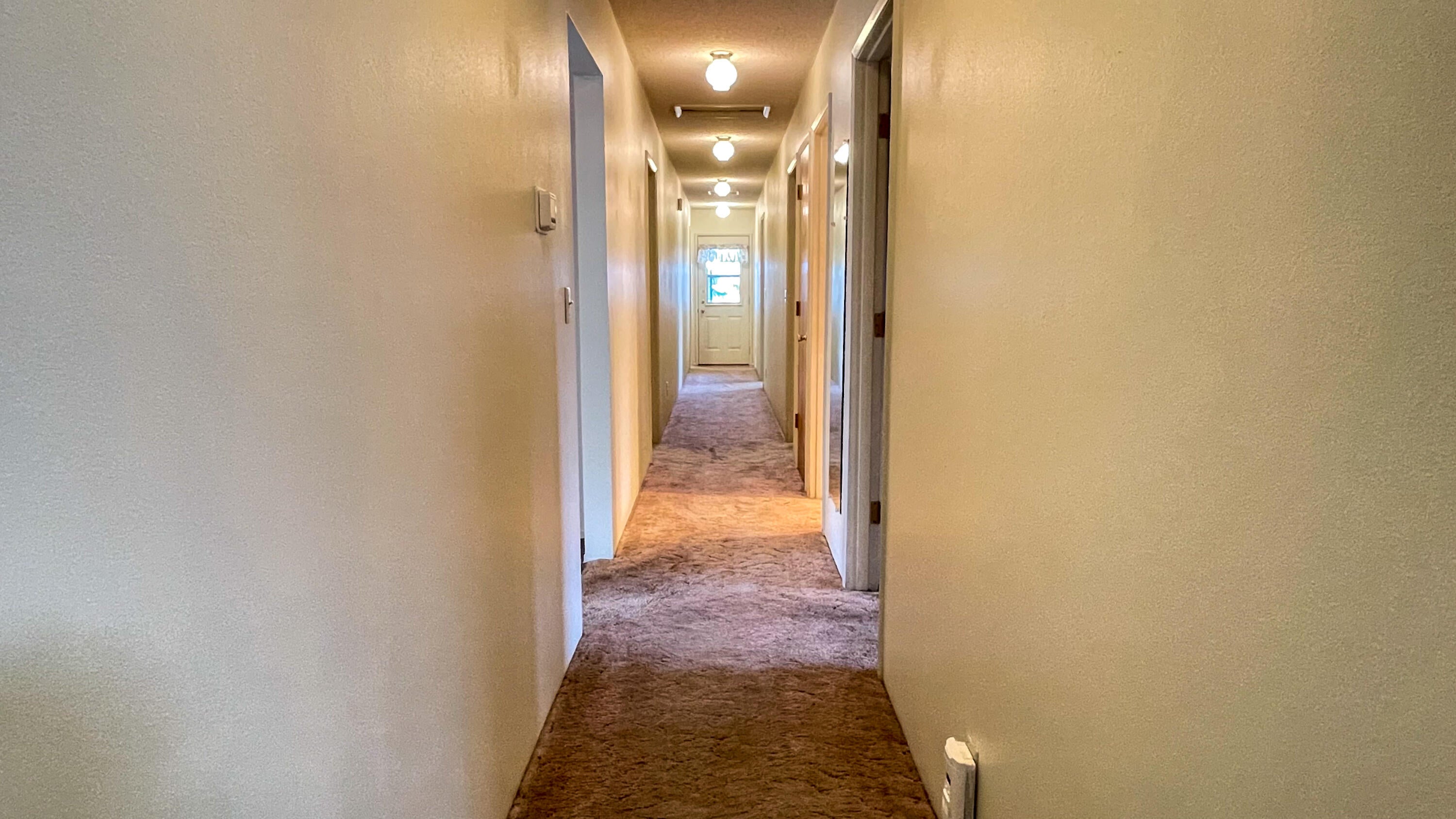 6302 Stillman Road Powell Butte, OR 97753 - Photo 19 of 39 hallway to bedrooms