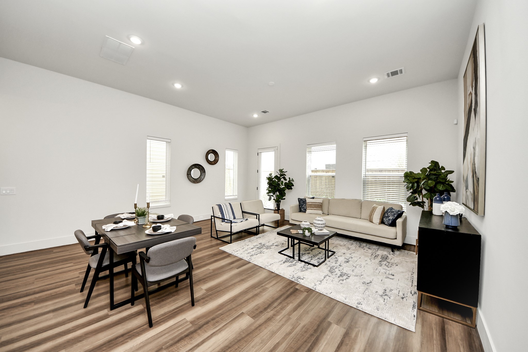 6018 Knox Street Houston, TX 77091 - Photo 13 of 42 a living room with furniture and wooden floor