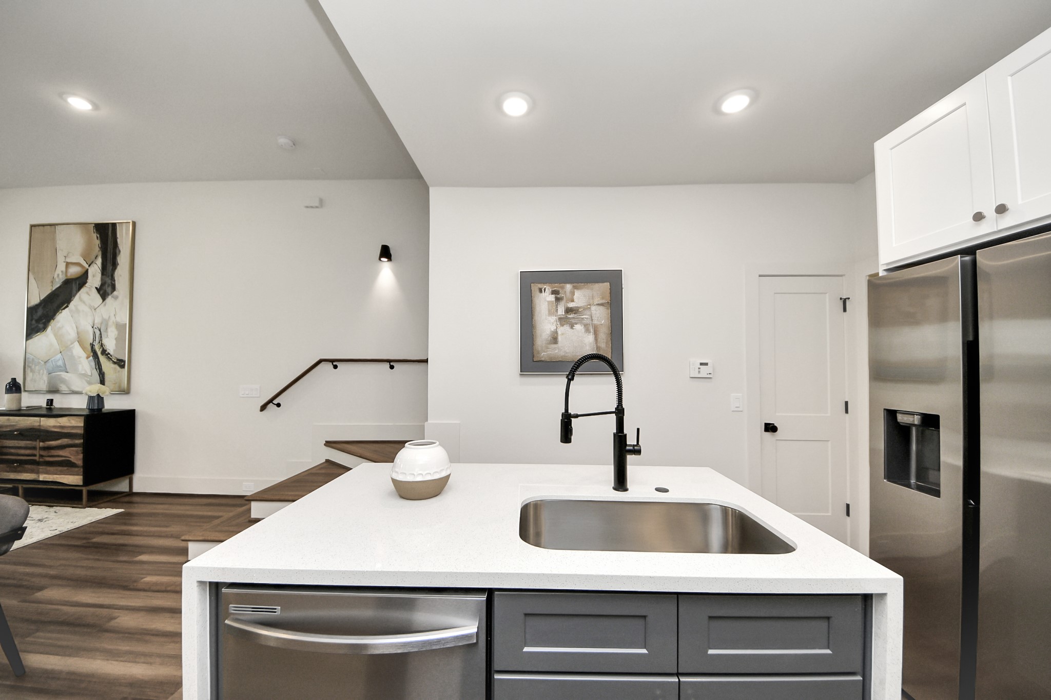 6018 Knox Street Houston, TX 77091 - Photo 18 of 42 a kitchen with a sink and a refrigerator