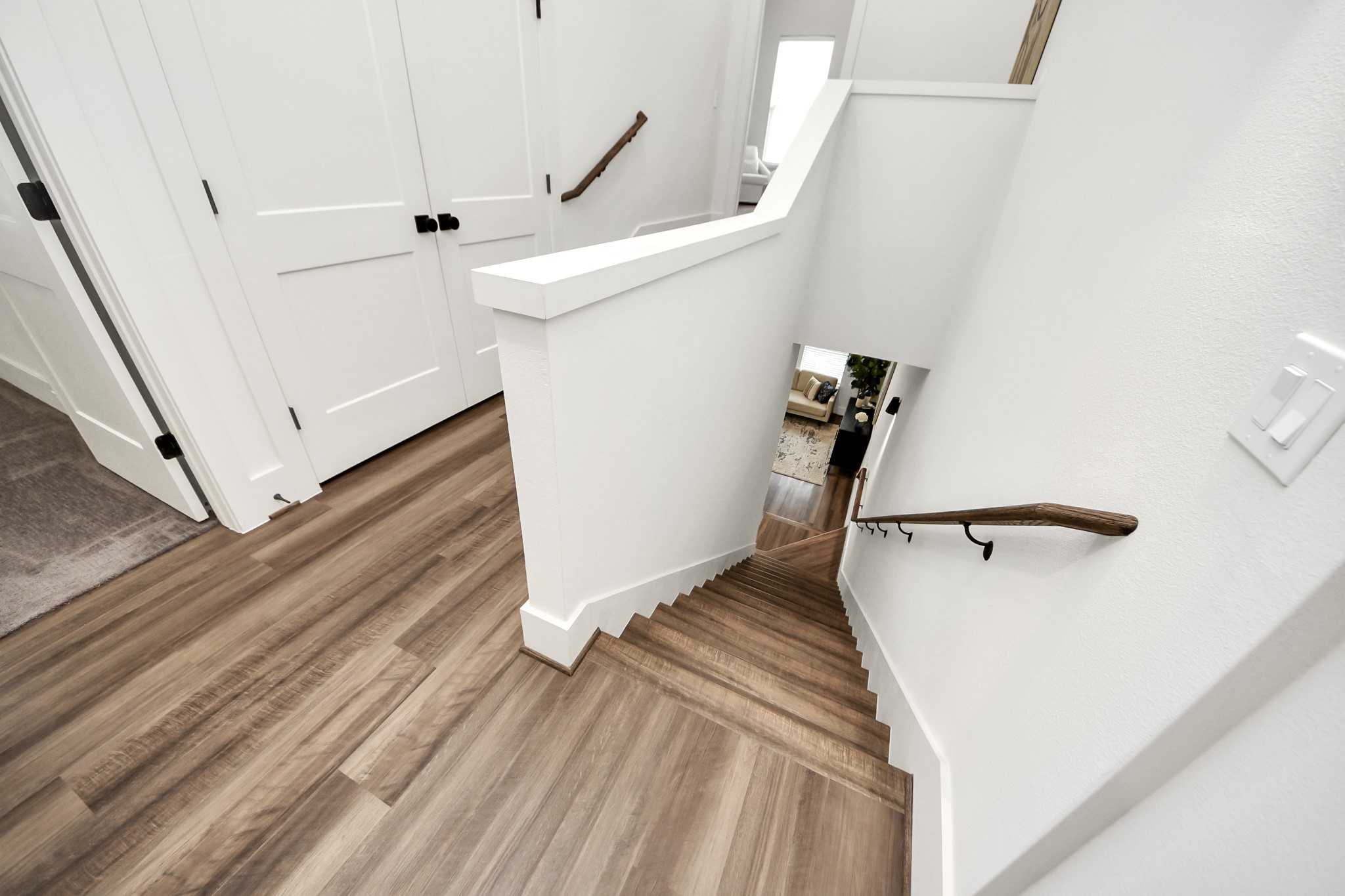 6018 Knox Street Houston, TX 77091 - Photo 22 of 42 a view of a room with wooden floor and white walls