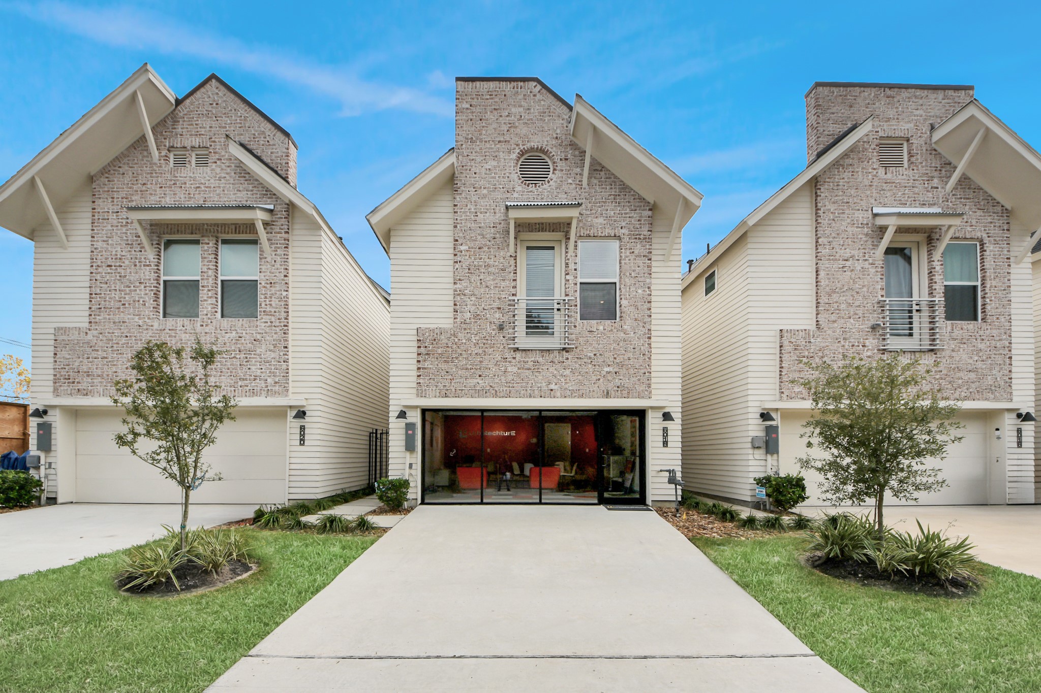 6018 Knox Street Houston, TX 77091 - Photo 4 of 42 a front view of a house with a garden and plants