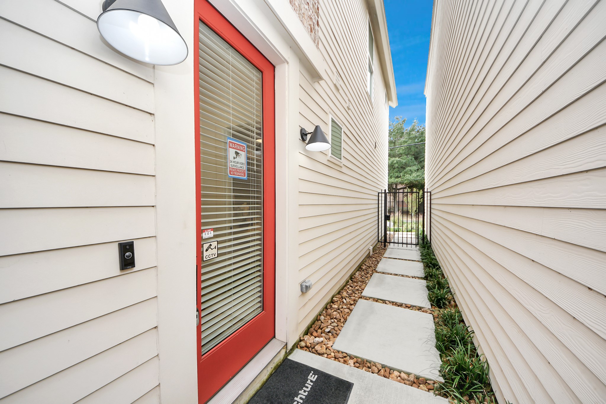 6018 Knox Street Houston, TX 77091 - Photo 5 of 42 a view of a balcony with wooden floor and fence