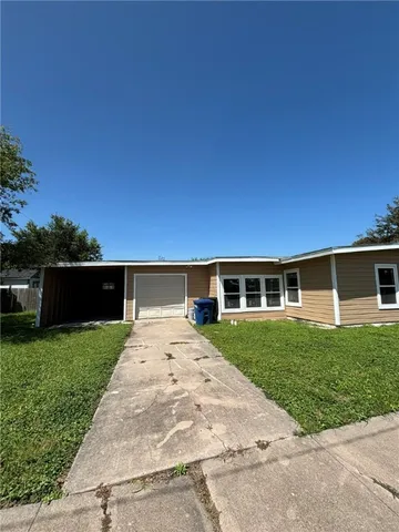 a view of house with yard