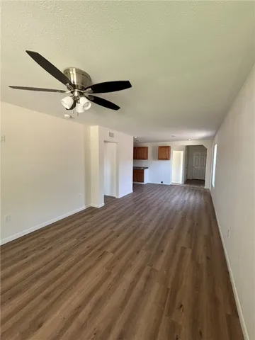 a view of a livingroom with a hardwood floor