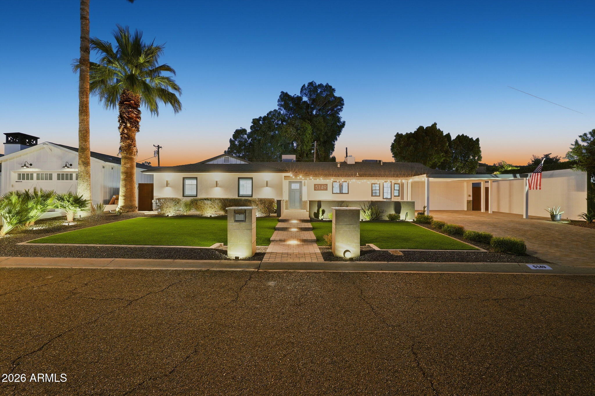 5149 North 34th Street Phoenix, AZ 85018 - Photo 3 of 70 a house view with a garden space