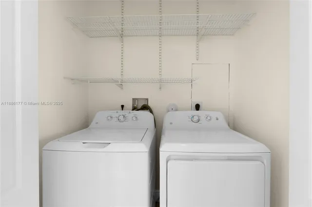 a utility room with dryer and washer