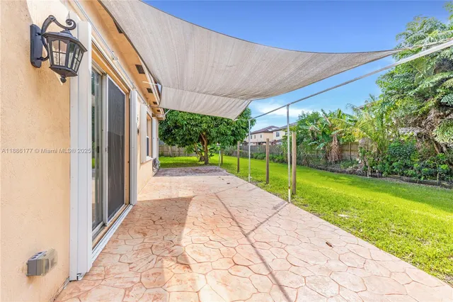 a view of porch with a backyard