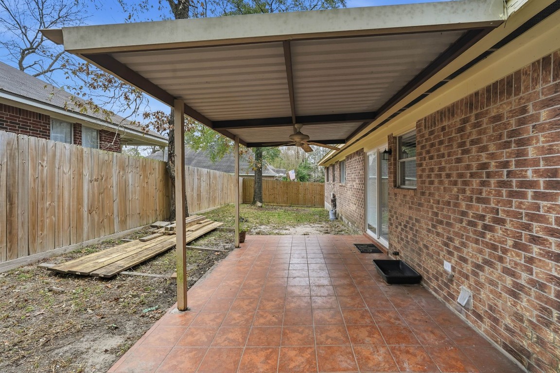 20 Moon Valley Court Conroe, TX 77304 - Photo 25 of 32 a view of backyard with green space