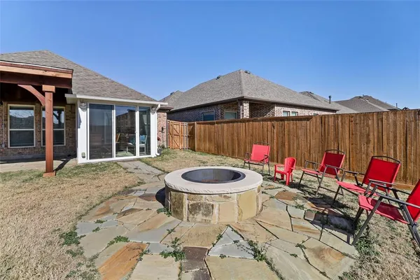 a table and chairs in the patio