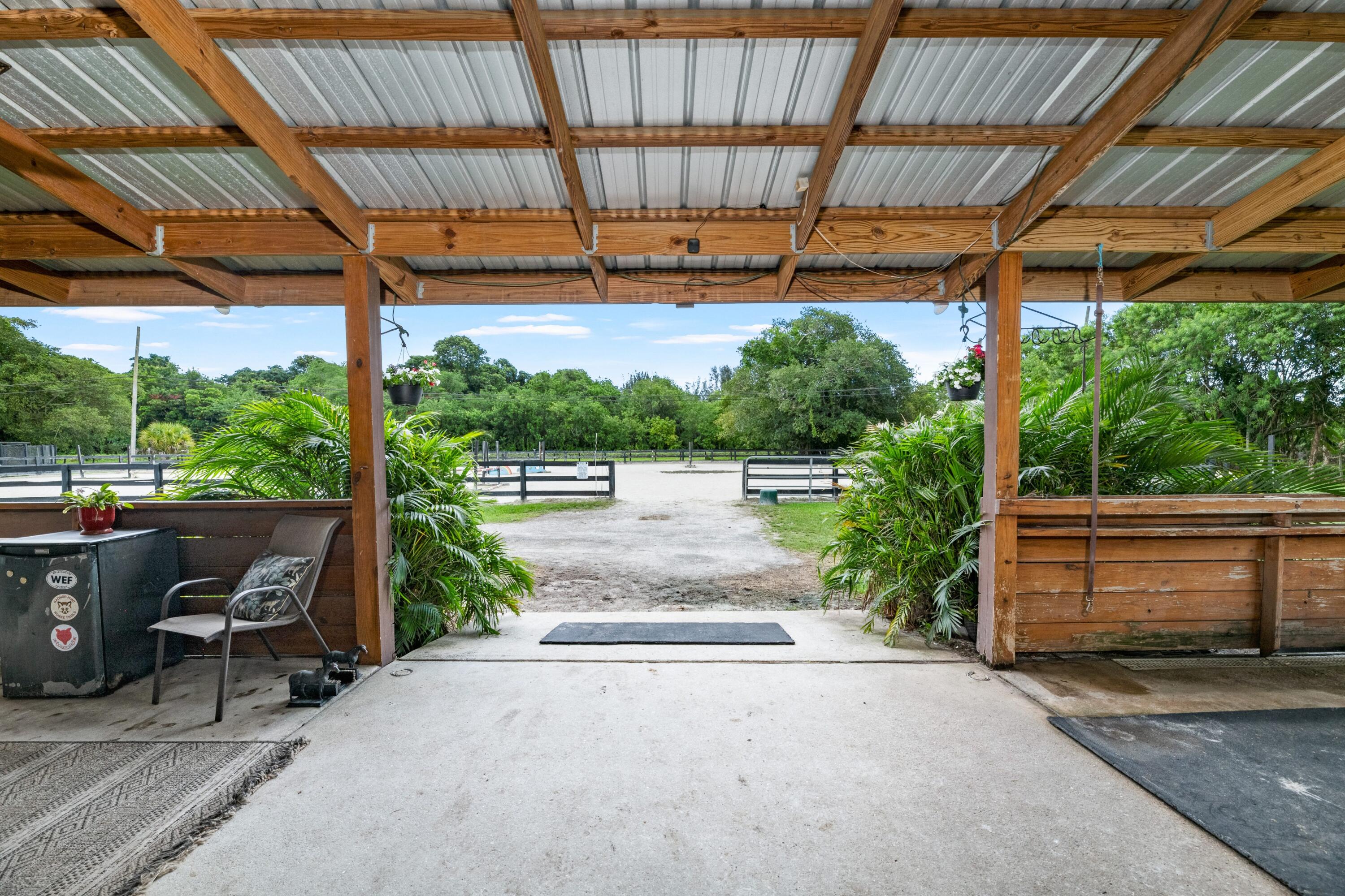 14536 N Road Loxahatchee Groves, FL 33470 - Photo 15 of 79 Center Aisle 7 Stall Barn