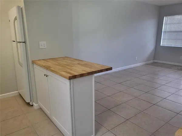 an empty room with cabinet