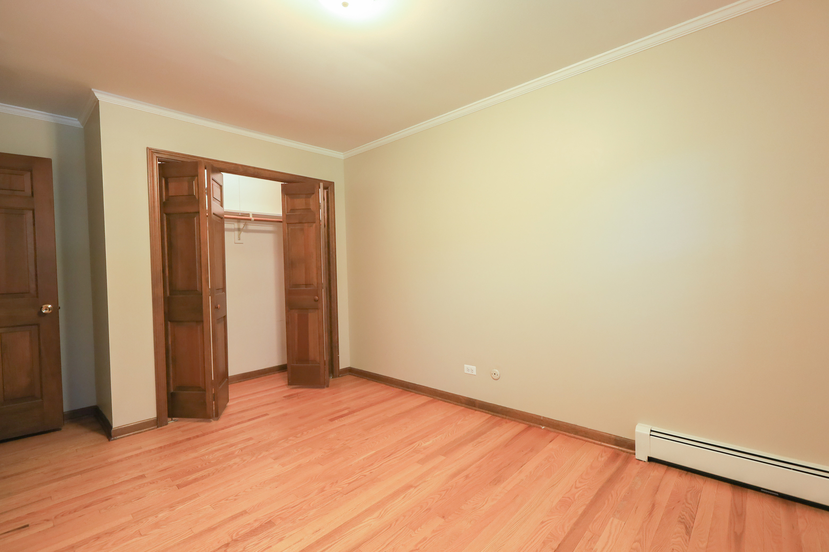 248 Florence Road Inverness, IL 60010 - Photo 17 of 25 an empty room with wooden floor