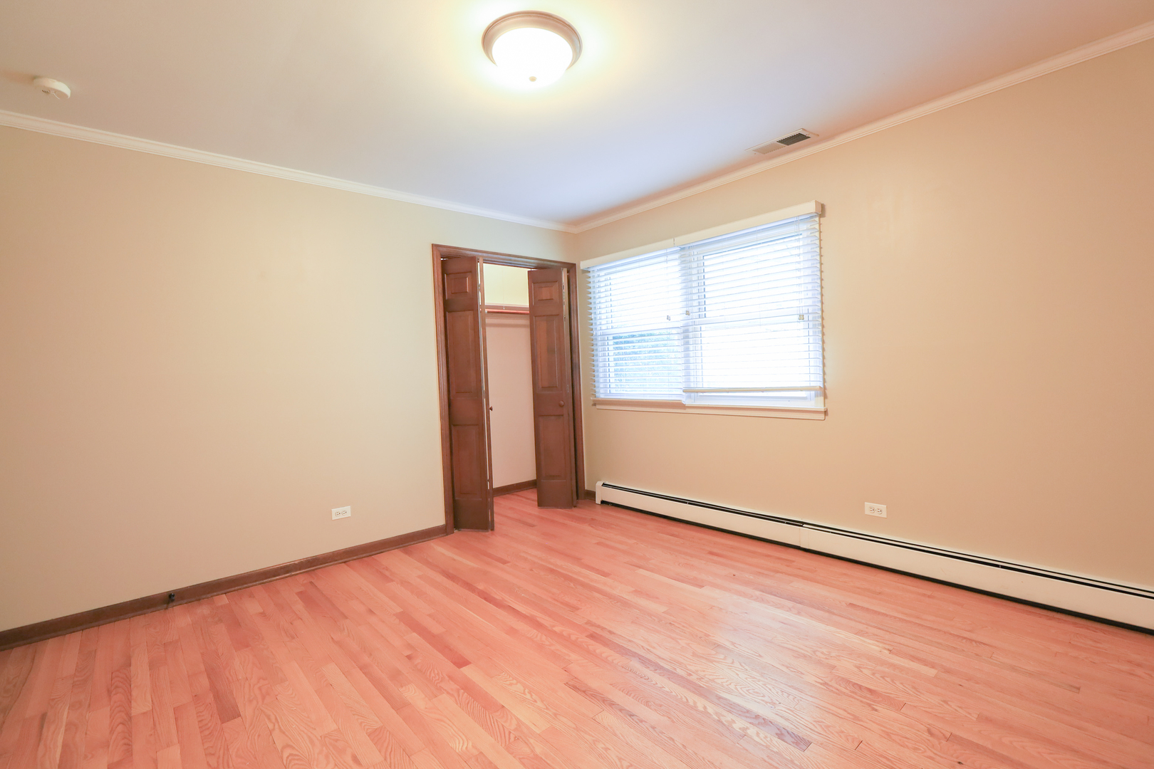 248 Florence Road Inverness, IL 60010 - Photo 20 of 25 an empty room with wooden floor and windows