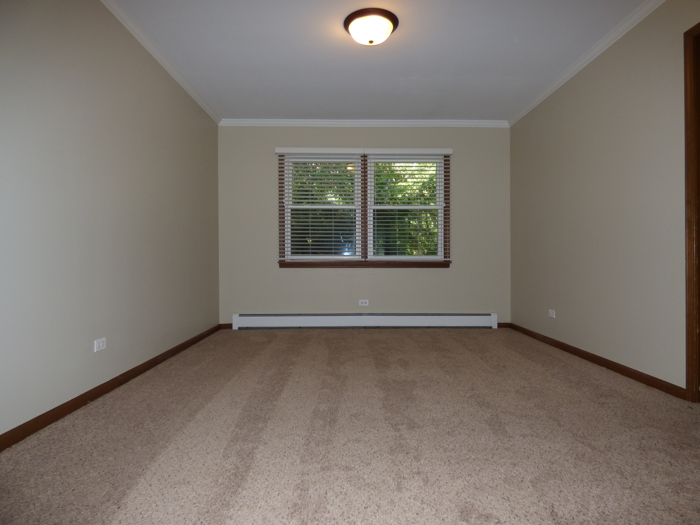 248 Florence Road Inverness, IL 60010 - Photo 4 of 25 an empty room with a window