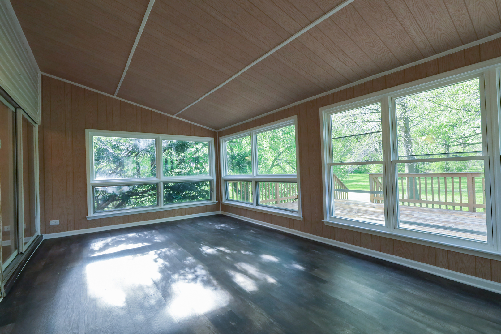 248 Florence Road Inverness, IL 60010 - Photo 10 of 25 a view of empty room with wooden floor and fan