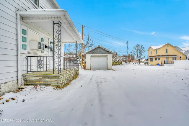 a front view of a house with a outdoor space