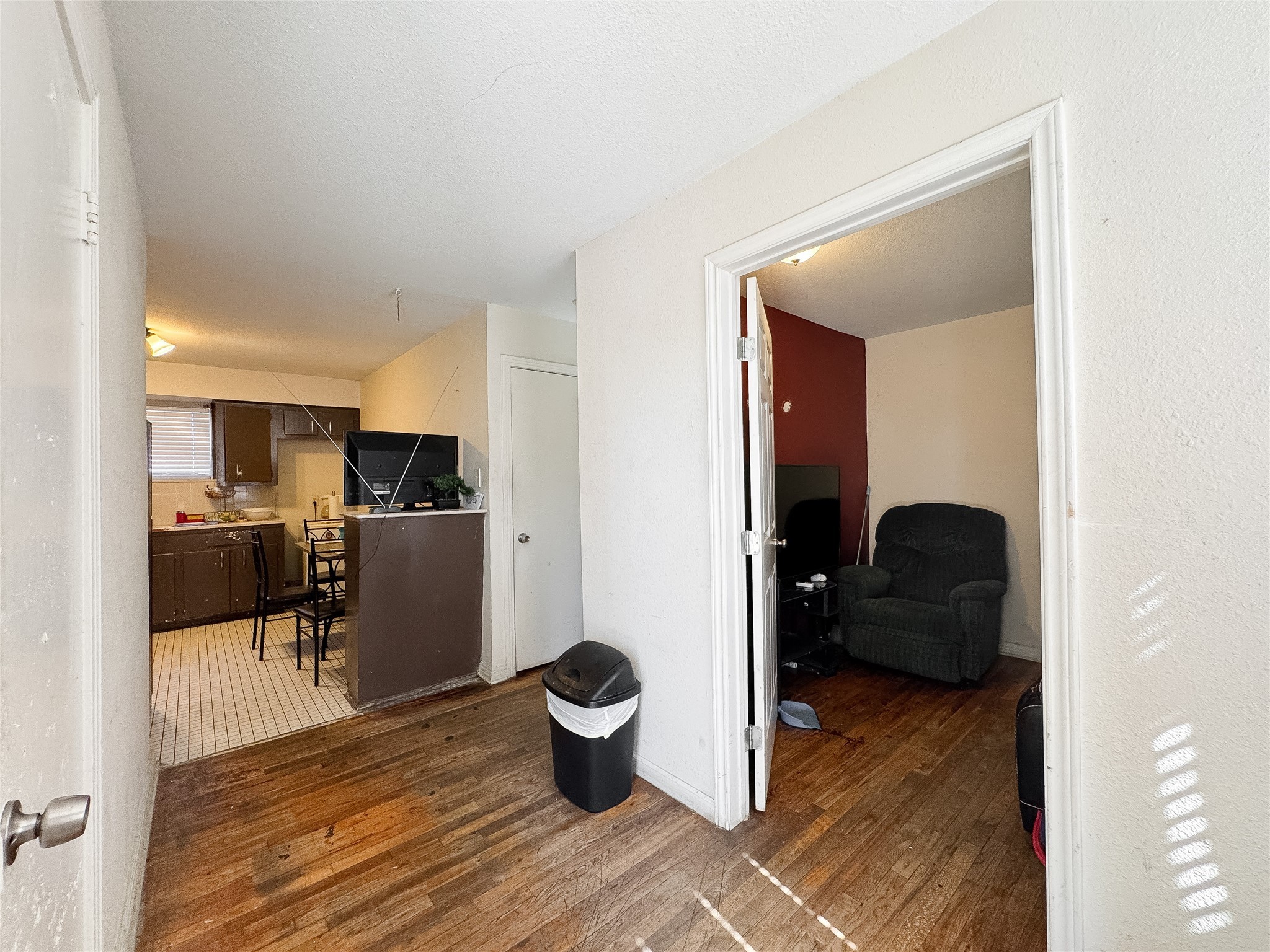 2712 Oakcliff Street Houston, TX 77023 - Photo 20 of 30 a living room with furniture and a view of dining room