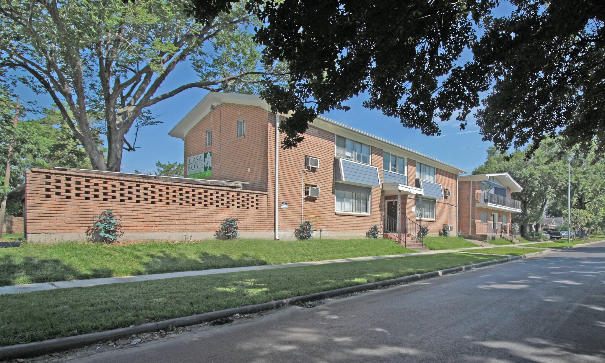 2712 Oakcliff Street Houston, TX 77023 - Photo 4 of 30 a front view of a house with a yard