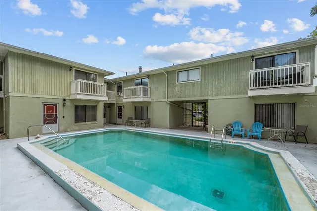 a room that has a rug and a chair