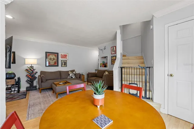 a living room with furniture and a table