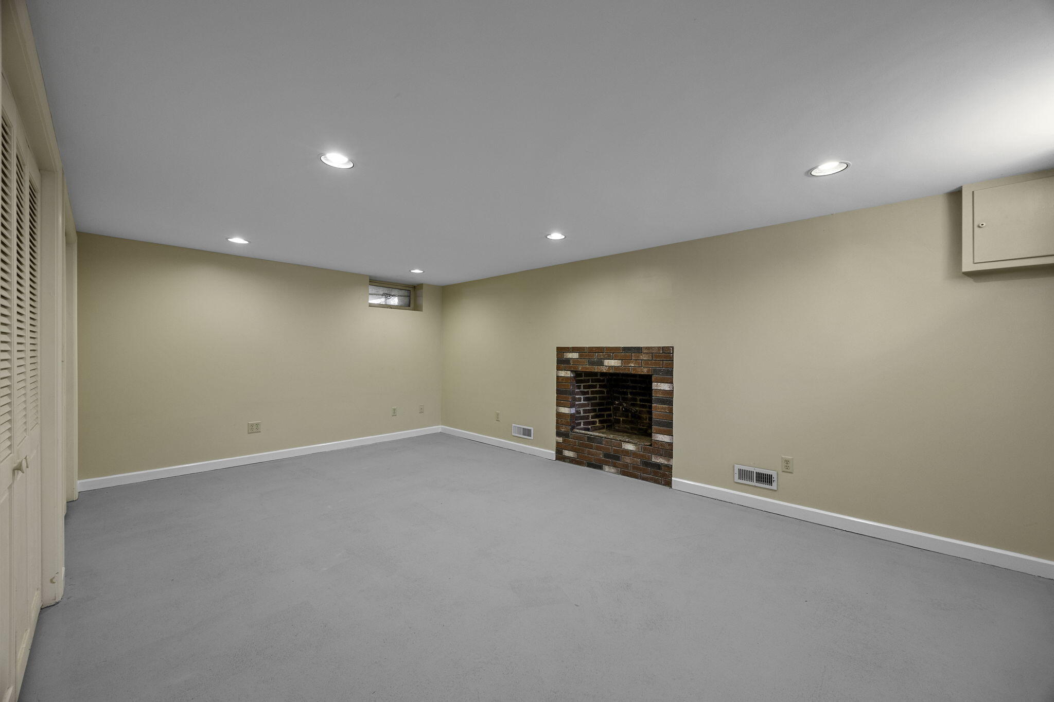 20 Namskaket Road Orleans, MA 02653 - Photo 36 of 63 a view of an empty room with a fireplace