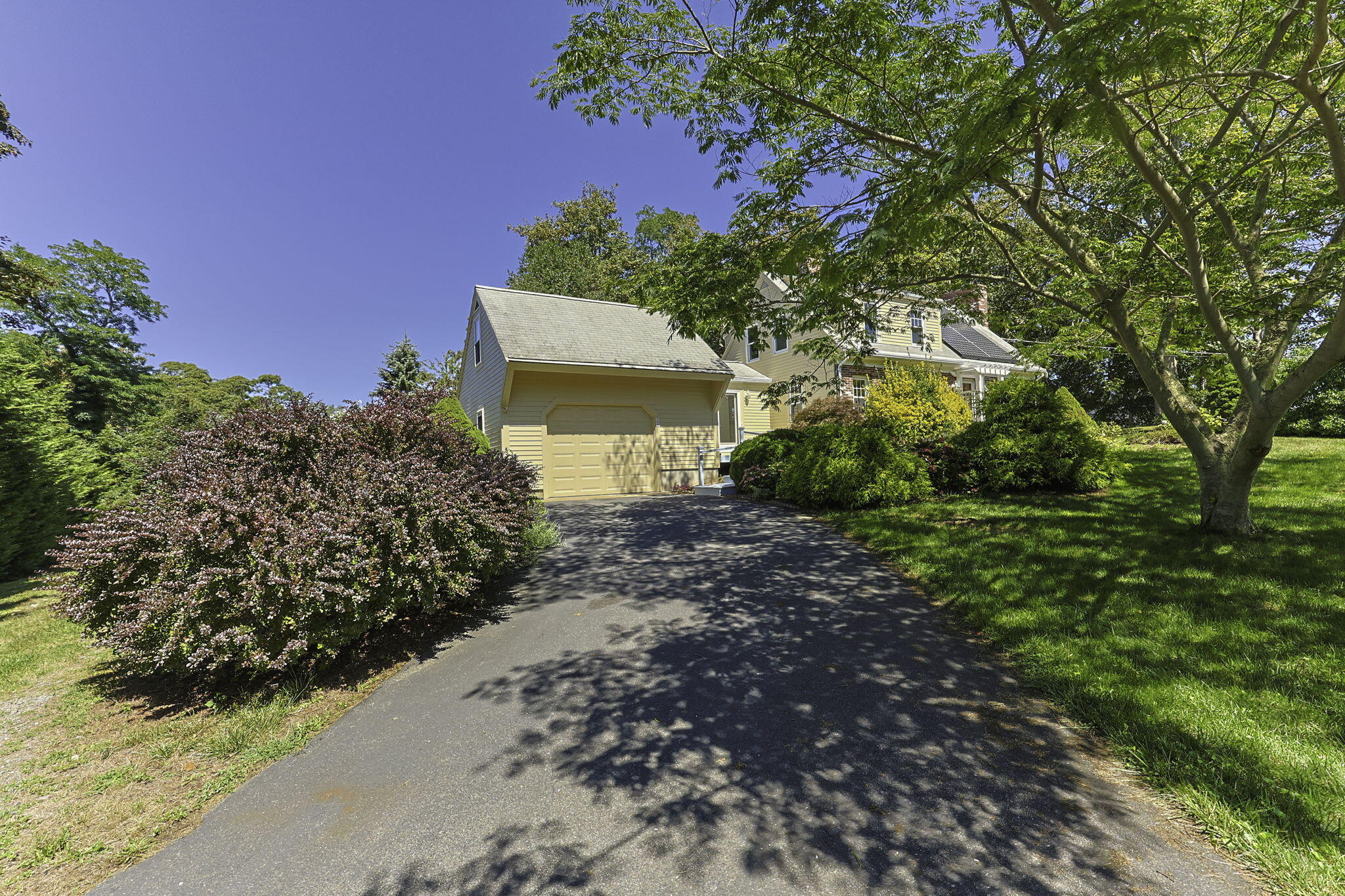20 Namskaket Road Orleans, MA 02653 - Photo 4 of 63 a front view of a house with a yard and fountain