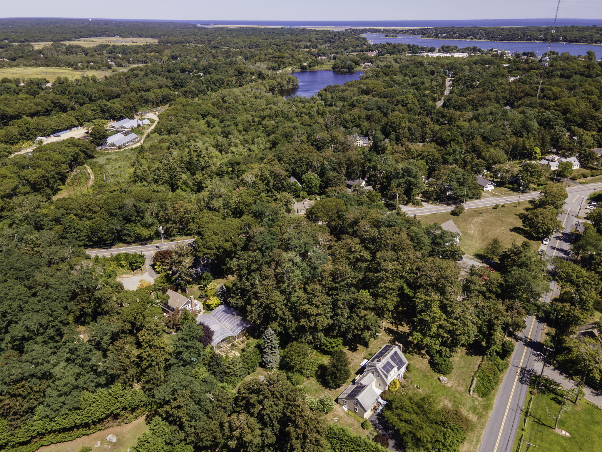 20 Namskaket Road Orleans, MA 02653 - Photo 57 of 63 an aerial view of a houses with a yard