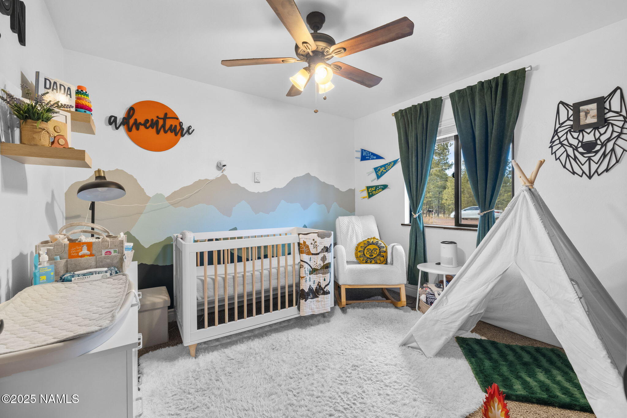 3628 East Pine Cone Drive Williams, AZ 86046 - Photo 11 of 23 a bedroom with furniture and a window