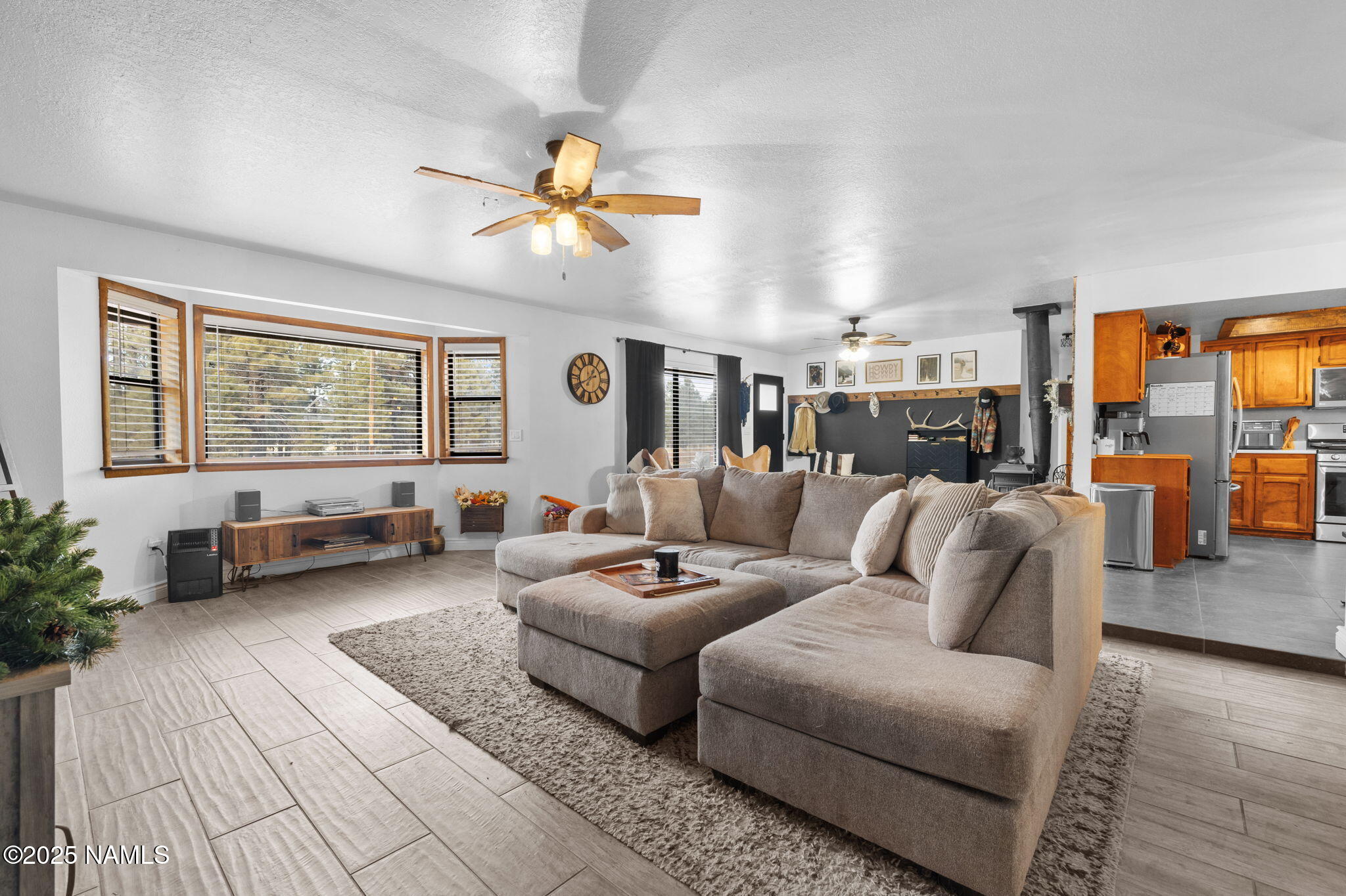 3628 East Pine Cone Drive Williams, AZ 86046 - Photo 8 of 23 a living room with furniture and wooden floor