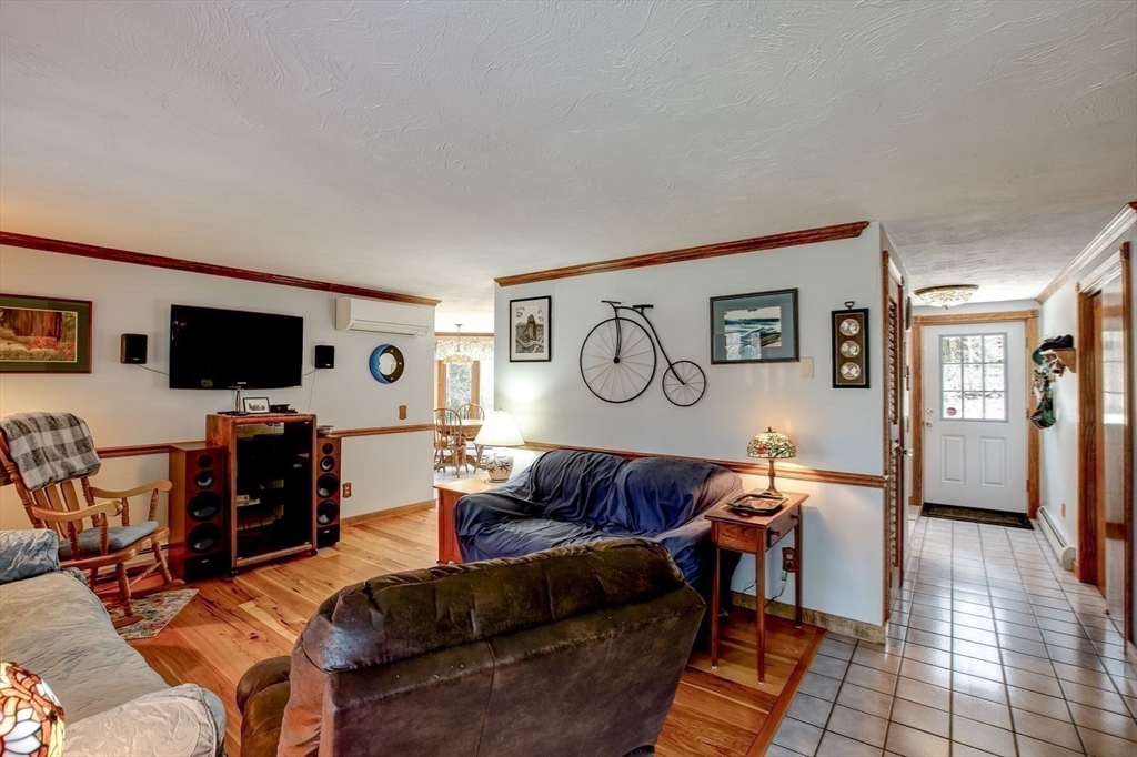 205 East Rindge Road Ashburnham, MA 01430 - Photo 23 of 40 a living room with furniture and a flat screen tv