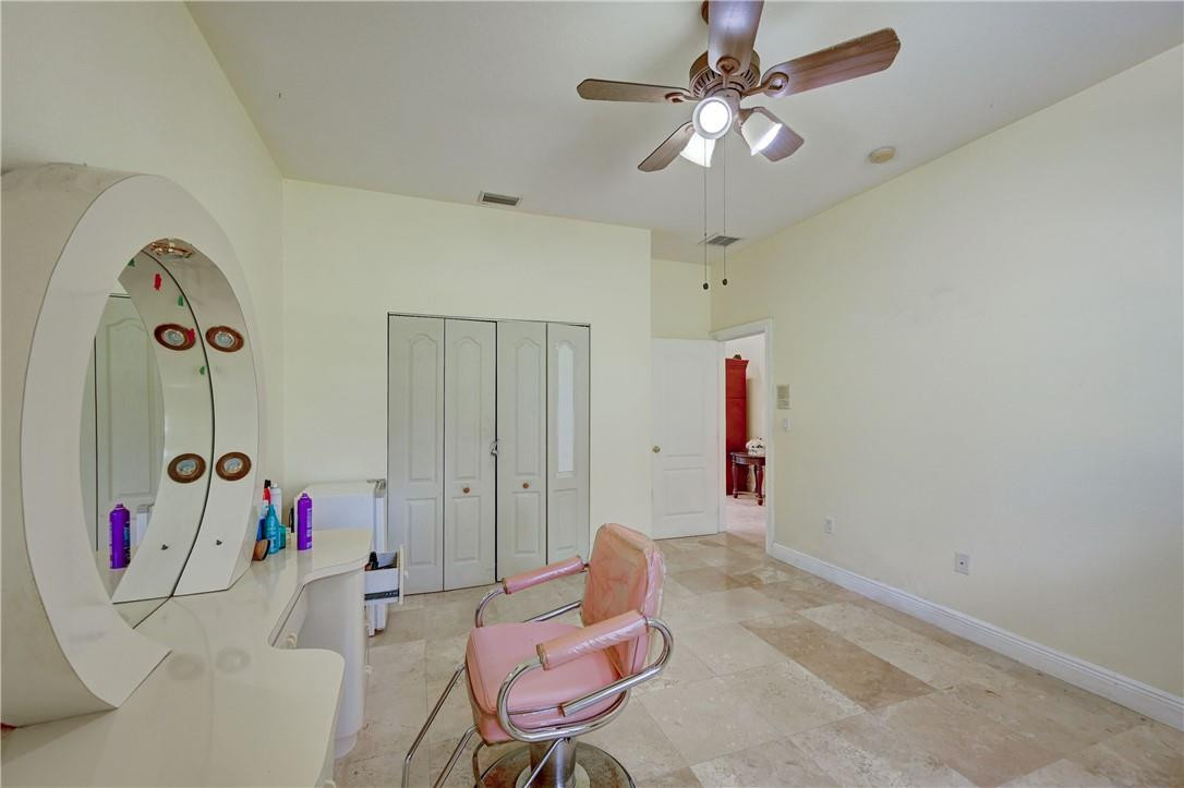 17400 Southwest 66th Street Southwest Ranches, FL 33331 - Photo 30 of 38 a room with furniture and white walls