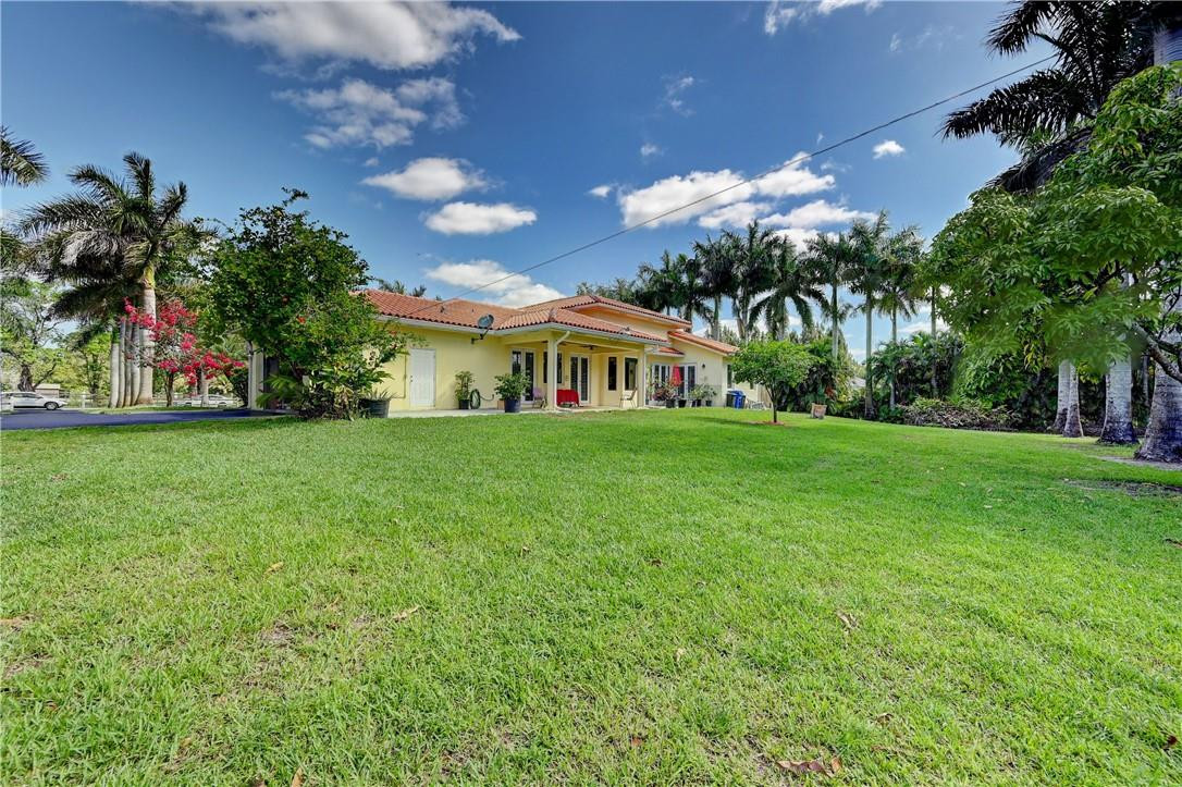 17400 Southwest 66th Street Southwest Ranches, FL 33331 - Photo 34 of 38 a house view with a garden space